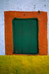 Colours;-Comoros-Archipelago;-France;-Green-shutter;-Housing;-Indian-Ocean;-Kaleidos;-Kaleidos-images;-La-parole-à-limage;-Laurent-Abad;-Mayotte;-Orange;-Stories-Pictures;-Wall;-Window;-Yellow